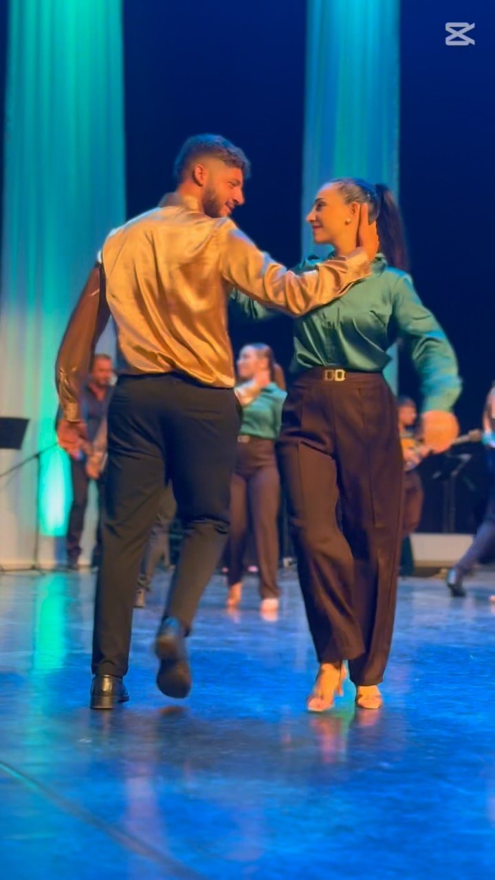 Dance couple performing on stage